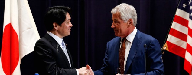 U.S. Secretary of Defense Chuck Hagel shakes hands with his Japanese counterpart Itsunori Onodera. (REUTERS/Issei Kato)