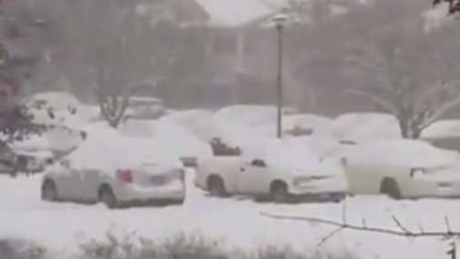 Heavy Snowfall Covers Vehicles During Snow Squall In Little Rock Arkansas