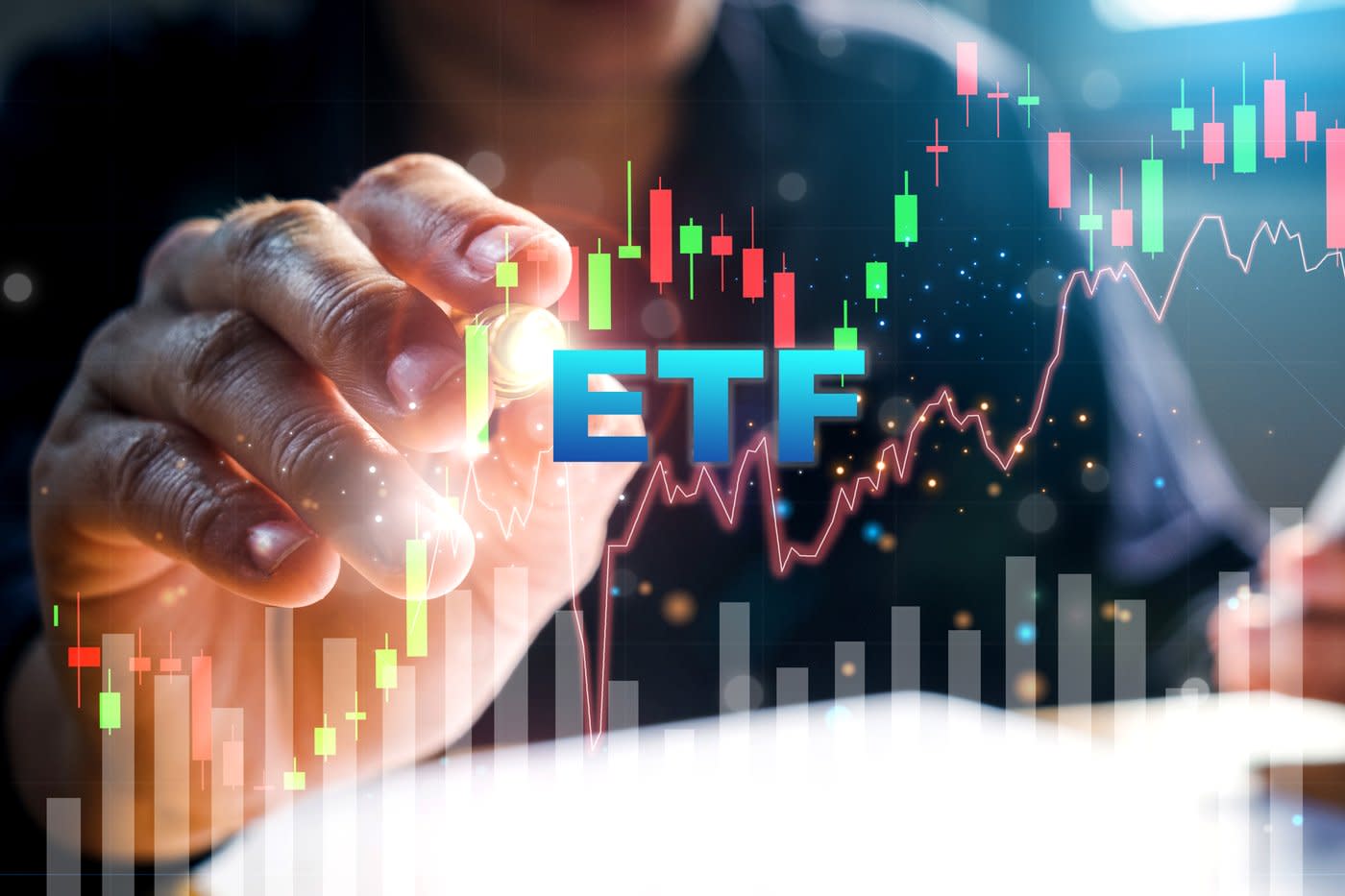 A hand pointing to a stock chart with 