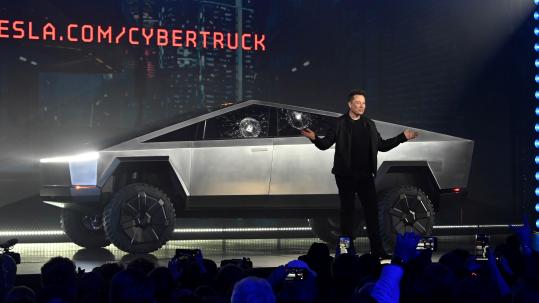 Stainless Steel Broken Glass And Buzz Tesla Makes A Pickup