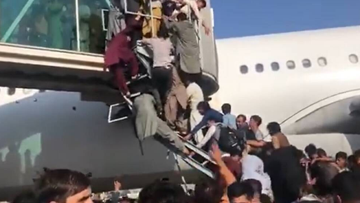 Watch Chaotic Scenes At Kabul Airport As Thousands Try To Flee [ 295 x 524 Pixel ]